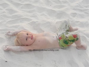 toddler in sand