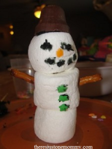 kids snowman craft that doubles as a tasty snowman treat