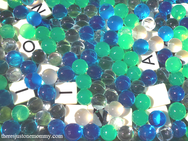 using water beads for spelling word practice