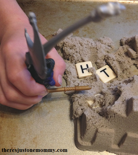 spelling practice fun with kinetic sand