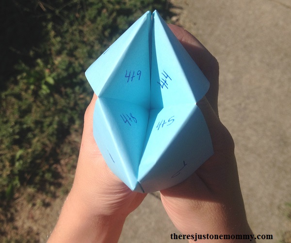 using a cootie catcher to practice math facts at home