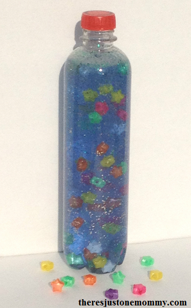 Floating Star Sensory Bottle -- sensory bottle made with hair gel; when shaken the floating star beads slowly rise to the top of the bottle 