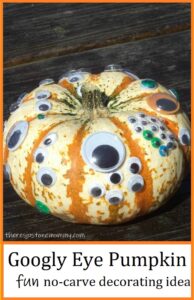 pumpkin decorated with googly eyes