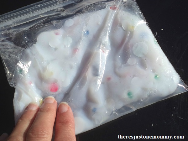 elmer's glue liquid starch slime; put DIY googly eye slime in a plastic bag for mess-free sensory play 