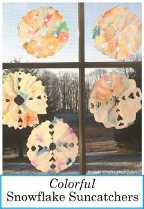 colorful snowflake suncatcher craft for kids