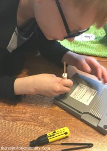 taking apart old computer parts with kids