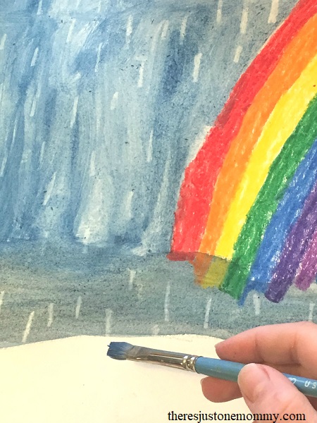 Looking for a simple April showers craft for kids? Try crayon resist painting!