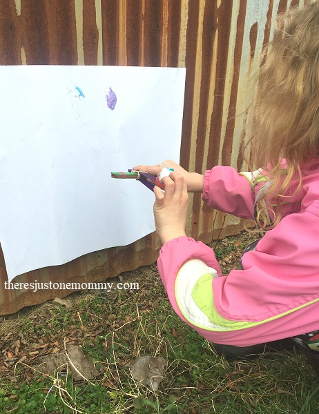 splat painting using a catapult and cotton balls 