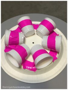photo of plastic cups taped to paper plate to make a water wheel