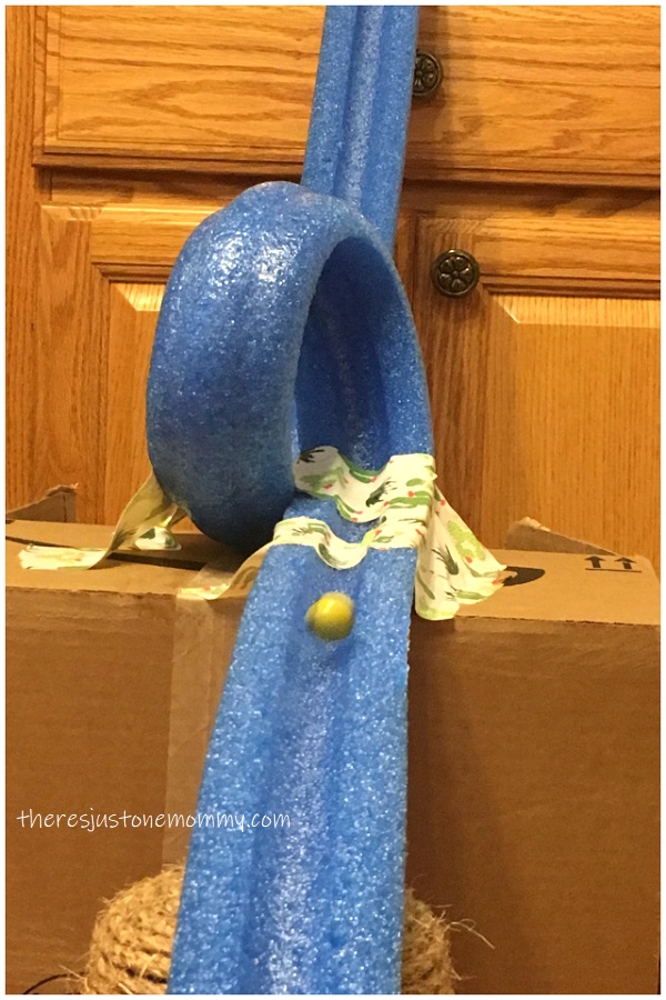making a pool noodle roller coaster -- fun STEM activity for kids