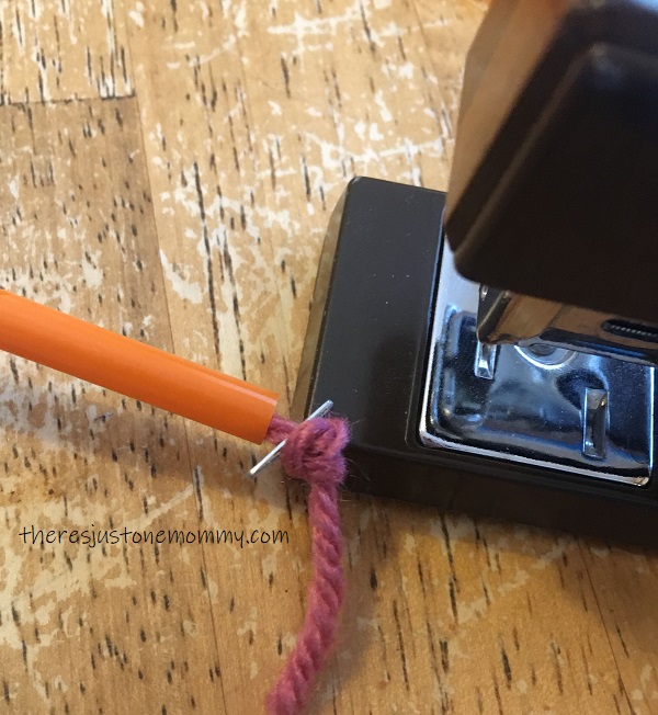 securing string through straws for STEM activity